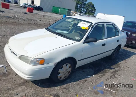 2000 Toyota Corolla Ce z USA, uszkodzony, nr VIN 2T1BR12E6YC342194